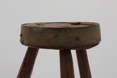 Brutalist French solid oak tripod stool with metal rim, 1850s