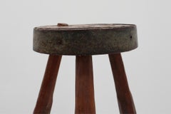 Brutalist French solid oak tripod stool with metal rim, 1850s