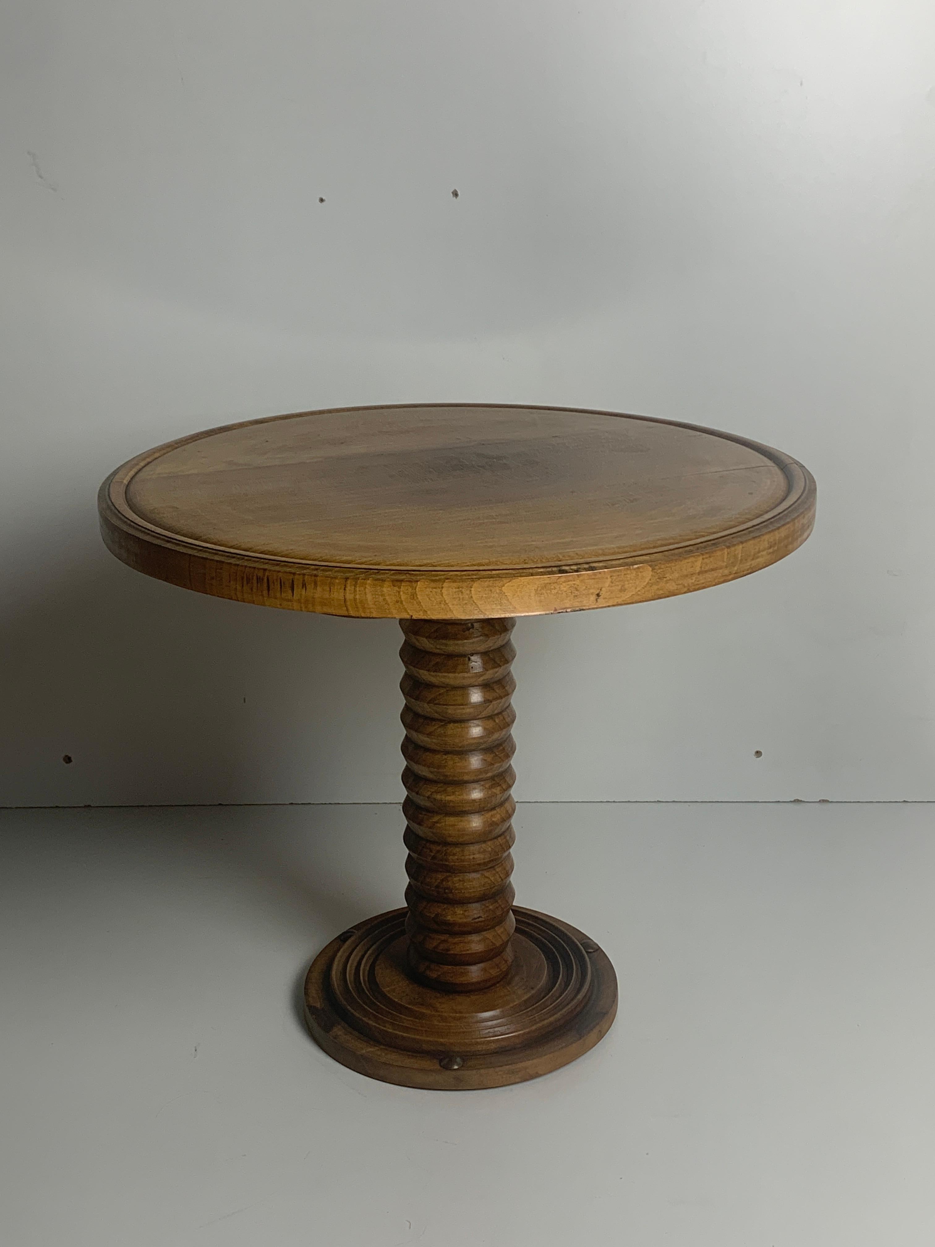 Stunning French low side table or pedestal dating from the 1940s- 1950s constructed in blond oak which is fairly unusual as they generally tend to be a lot darker. The copper rivets at the bottom are also a rare and subtle touch. The base is made of