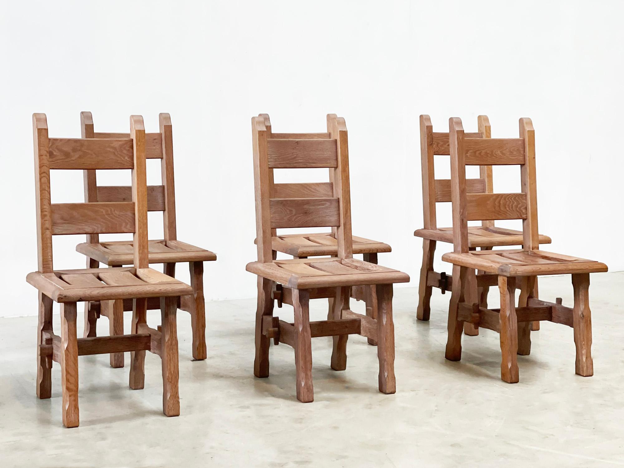 Brutalist dining chairs. these dining chairs were made in belgium in the 80s. They have the typical brutalist shape from those years. These chairs are very reminiscent of the chairs of