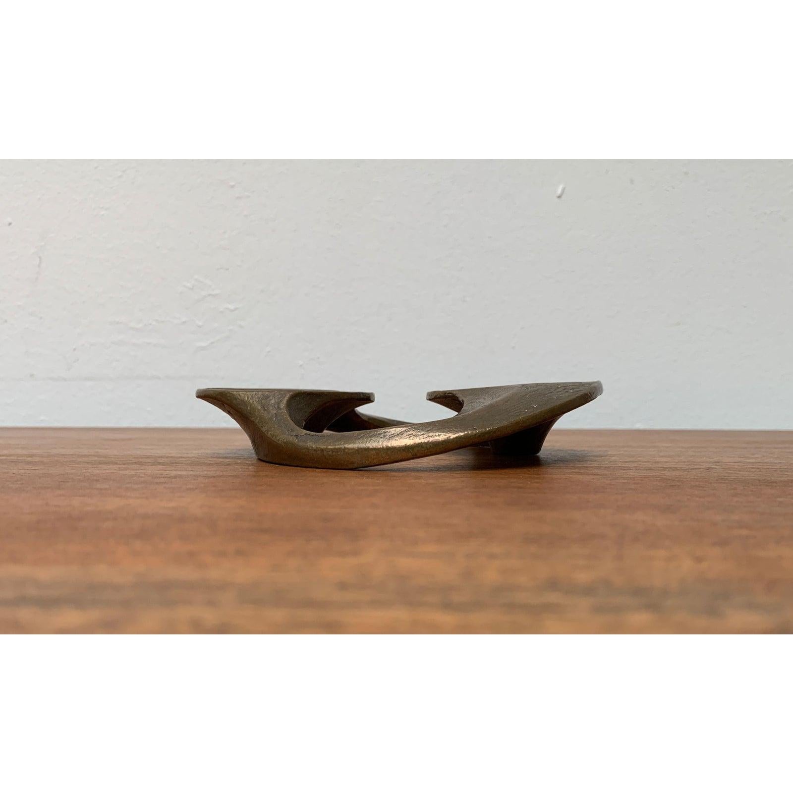 Brutalist German Bronze Candleholder from Harjes, 1960s, in Very Good conditions. Designed 1960 to 1969 This piece has an attribution mark.

Additional information:
Materials: Metal
Style: Brutalist, Mid-Century Modern
Country of Origin: