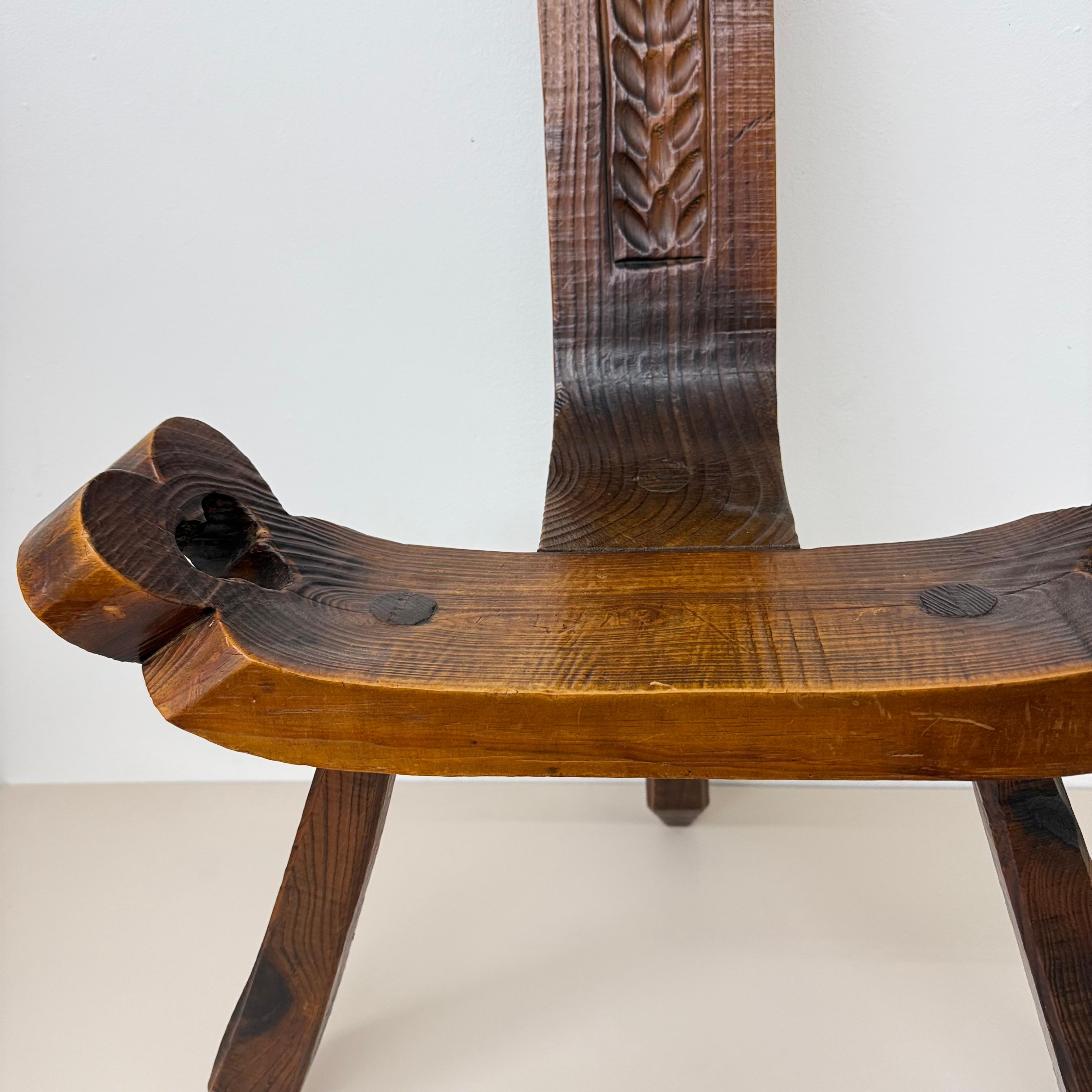 Late 20th Century Brutalist hand carved oak Spanish tripod chair , 1970s For Sale