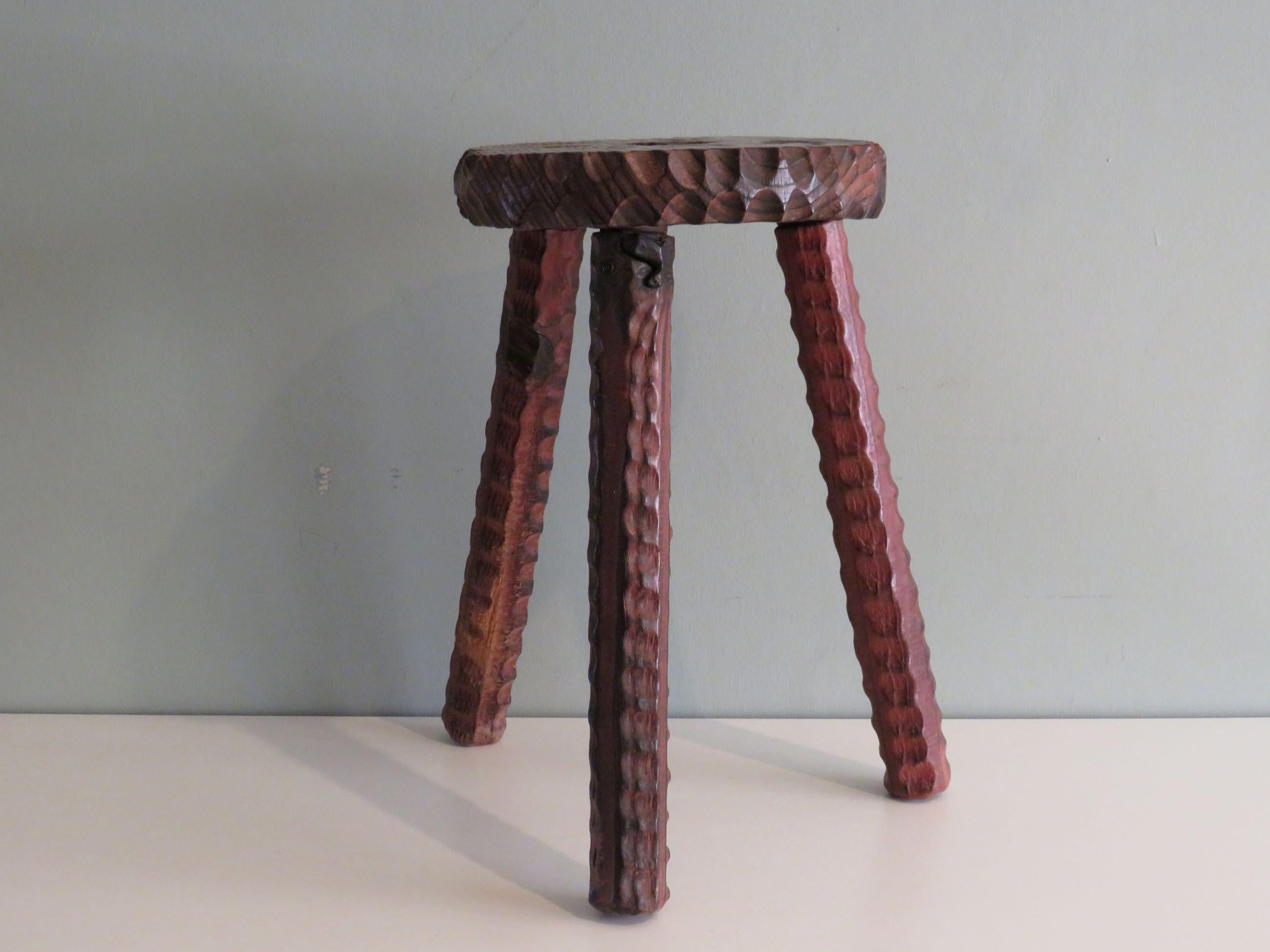 Wooden stool with sturdy legs and a seat with a recess to pick up the stool.
Height: 36.5 cm, width 33 cm and depth 27 cm.
The seat has an irregular shape and measures approximately 24 x 24 cm.