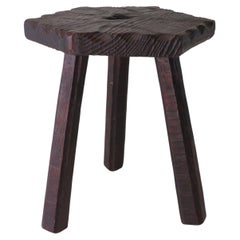 Brutalist, hand-carved tripod Spanish stool, 1960