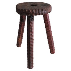 Brutalist, hand-carved tripod Spanish stool, 1960