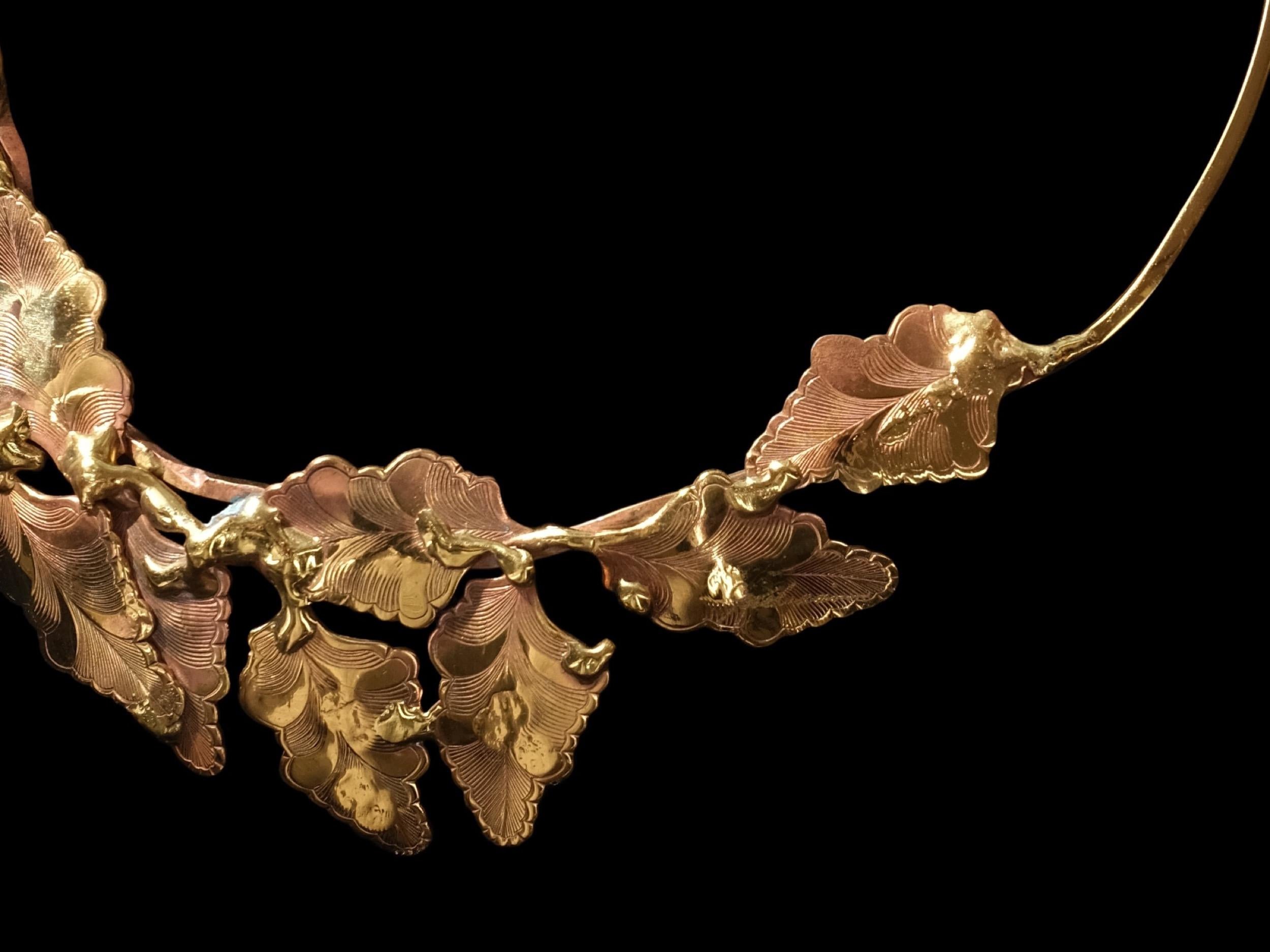 Handmade, Hand-forged Brass Choker
Made by unknown artist
Two tone brass with delicate etched lines
Hand tooled leaves wrap around collar bone
Brutalist Welded details
In the style of a rudimentary Claude Lalanne 
Handmade hook closure
Measuring 6