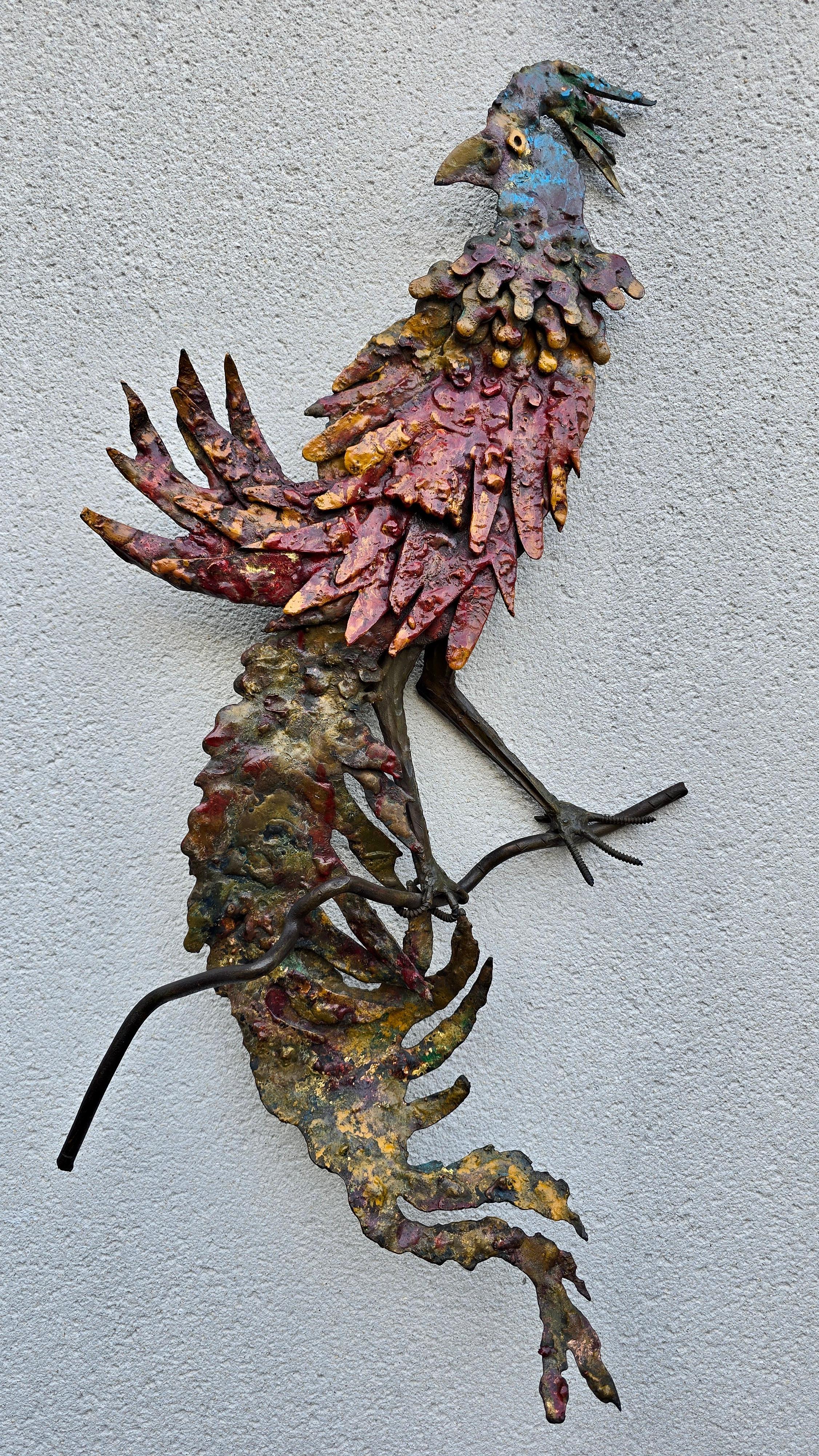 Brutalist Handcrafted Wall Sculpture of a Rooster, Europe, circa 1960s–1970s

A striking Brutalist wall sculpture depicting a rooster, handcrafted in forged and welded metal with an expressive polychrome finish. The surface is richly textured with