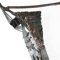 Brutalist Handmade Christ made of steel and bronze details
