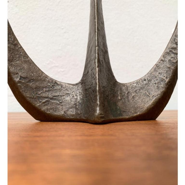Brutalist Heavy Bronze 3-Arm Candleholder from Dalbeck, 1960s, in Very Good conditions. Designed 1960 to 1969 official proof of authenticity such as vintage catalogs,
designer records, or other literature sources.

Additional information:
Materials: