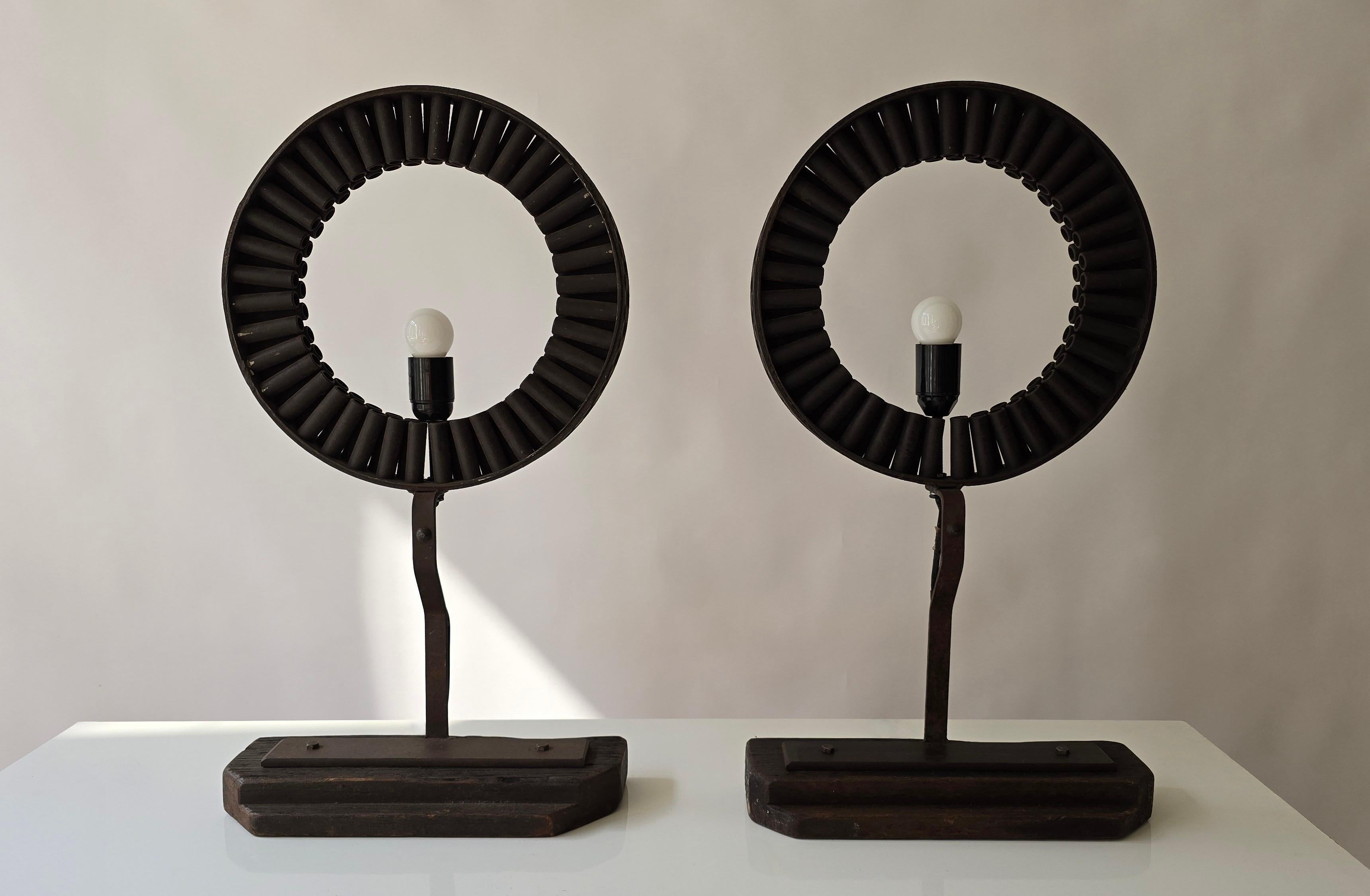 Brutalist Industrial Table Lamp Made from Reclaimed Machinery Parts and Wood, 1970s 

A striking Brutalist table lamp crafted from reclaimed industrial machinery parts and aged solid wood. The bold circular design is made of welded steel tubes,