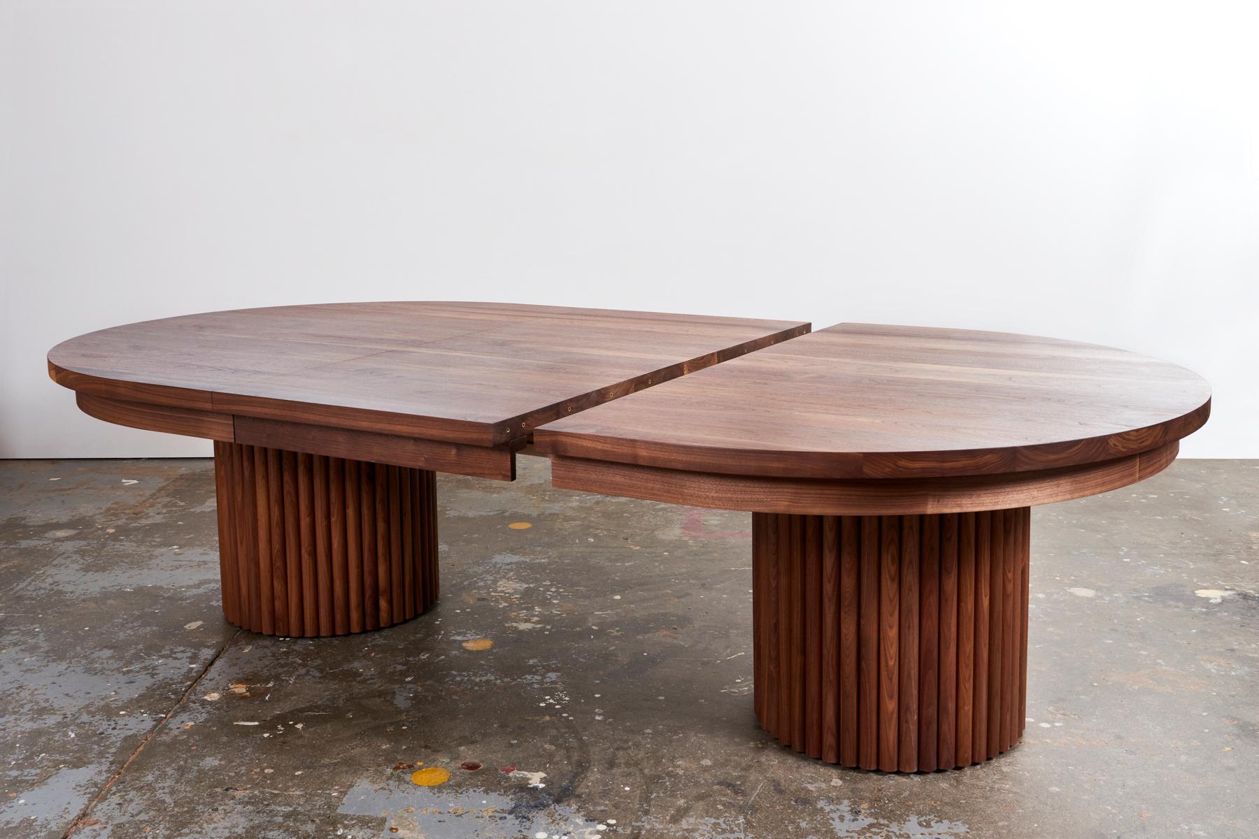 Unapologetically bold, Kate Duncan's dining table is a statement piece that pays homage to both a contemporary aesthetic as well as brutalist architecture. Columns of coopered splines and a hefty solid wood top create a table you just can’t miss.