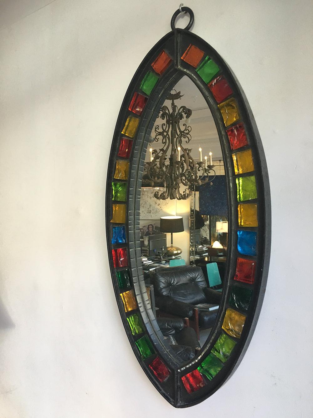 French Brutalist Iron and Coloured Glass Elliptical Mirror