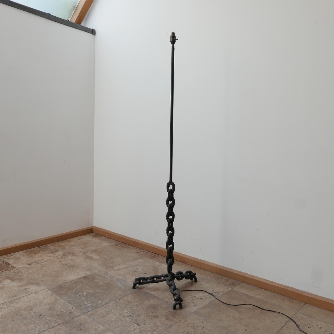 A brutalist iron floor lamp. 

France, circa 1950s. 

Chain link base with a straight rod above. 

Re-wired and PAT tested. 

Dimensions: 42 W x 35 D x 154 H in cm.

Delivery: POA

