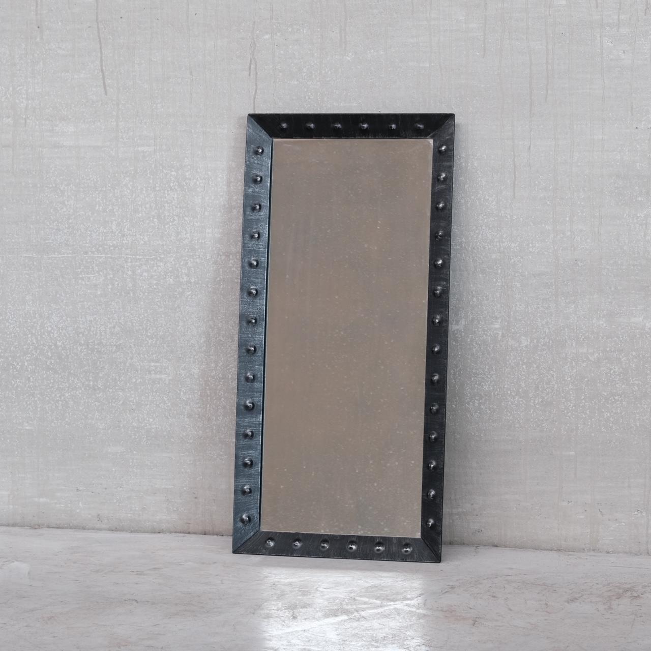 A good looking brutalist style mirror. 

Belgium, c1980s. 

Iron surround. 

Good condition generally, some scuffs and wear commensurate with age. 

Location: Belgium Gallery. 

Dimensions: 85 H x 42 W x 4 D in cm. 

Delivery: POA

We