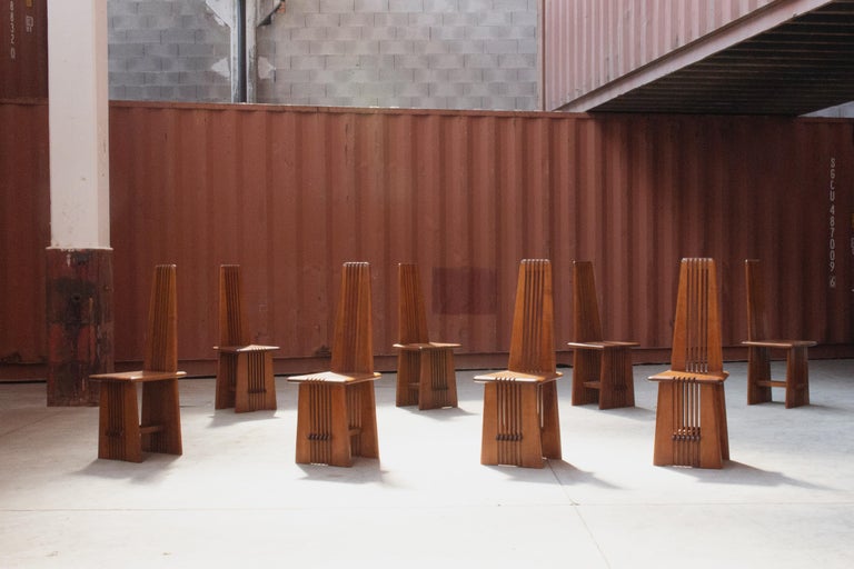 Brutalist Italian dining chairs, 1970's, patinated walnut, set of eight

This set of eight chairs is the typical expression of the Italian Brutalism of the 70's. Explicitly reminding the modern style of Carlo Scarpa and Charles Rennie Mackintosh,