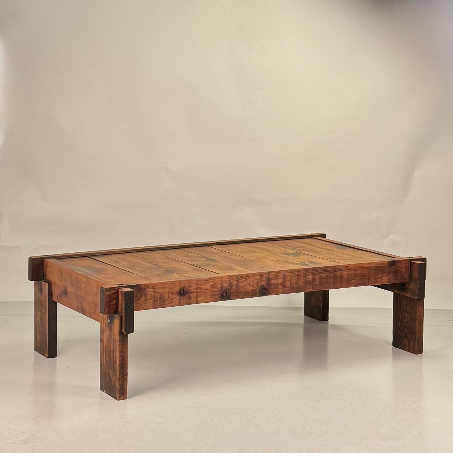 Brutalist knotted pine low coffee table.
Great wabi-sabi look.