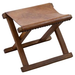 Brutalist leather and oak folding stool, Denmark, 1950s
