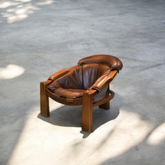 Brutalist leather tripod armchair, Italy, 1970's