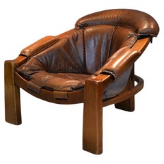Brutalist leather tripod armchair, Italy, 1970's