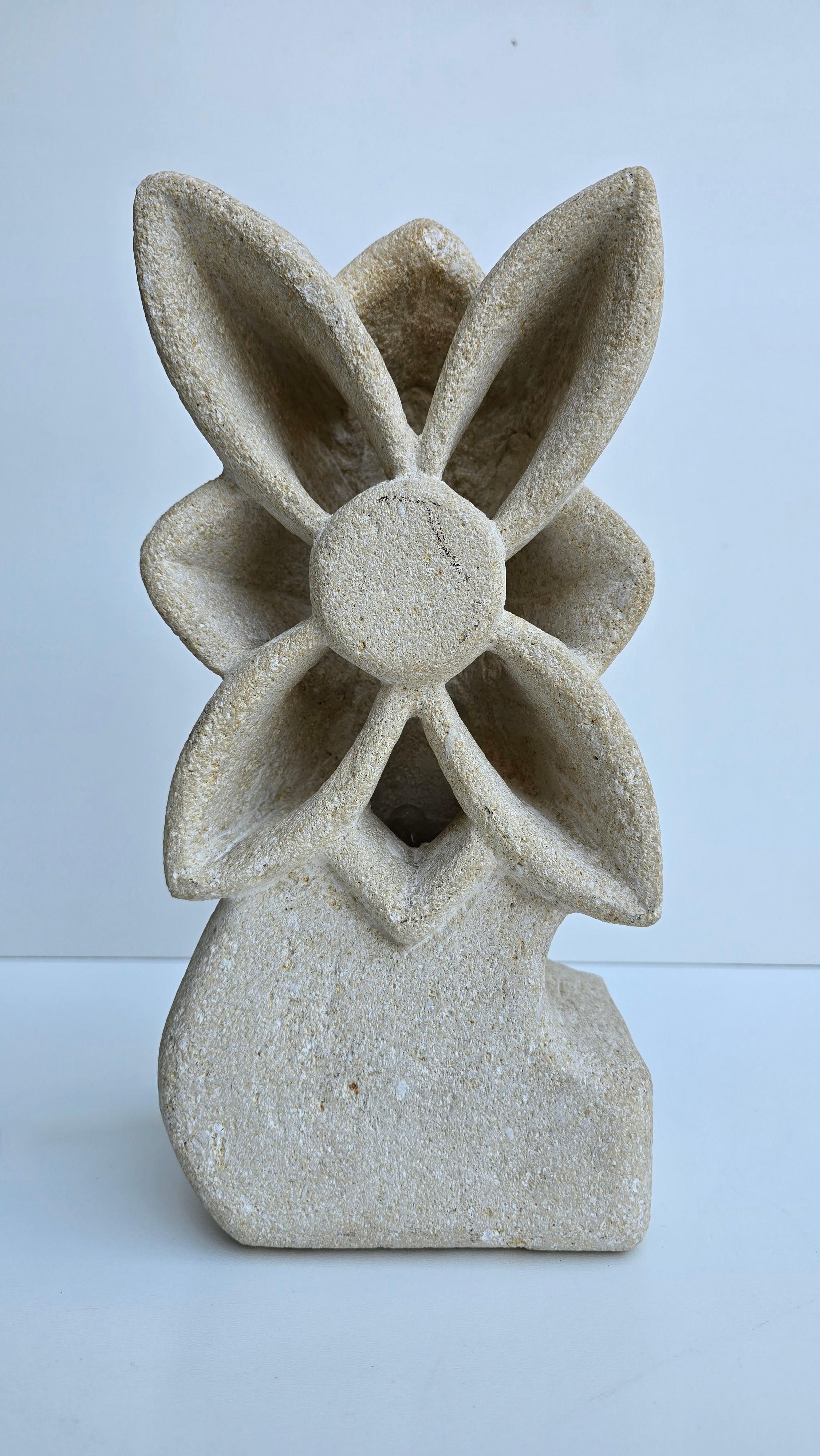 Brutalist Limestone Flower Lamp, France, 1970s — in the style of Albert Tormos

A sculptural brutalist table lamp hand-carved from solid limestone, crafted in France during the 1970s. This unique piece features a stylized flower form with