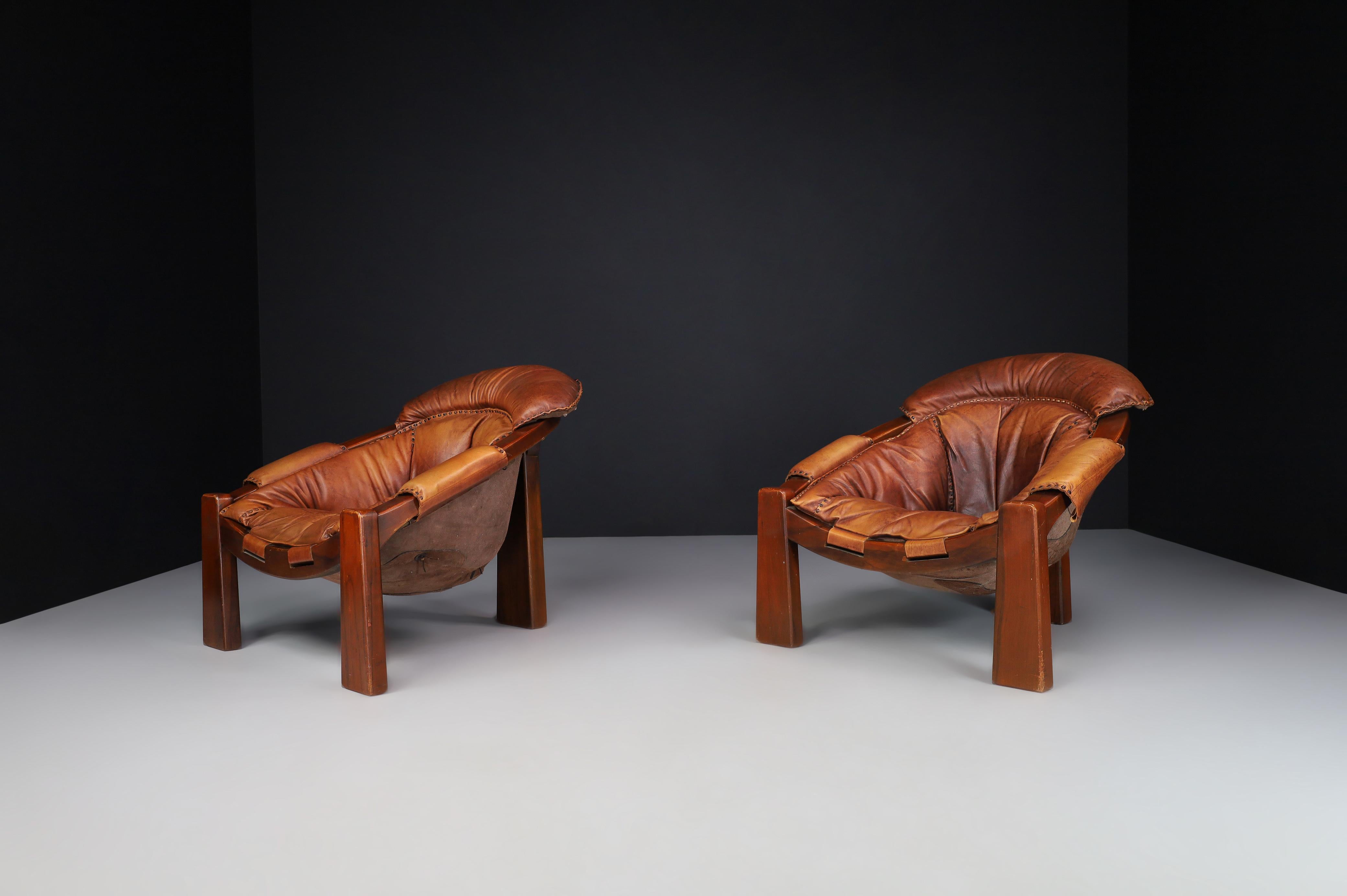 Italian Brutalist Luciano Frigerio Patinated Cognac Leather Lounge Chairs, Italy, 1970s