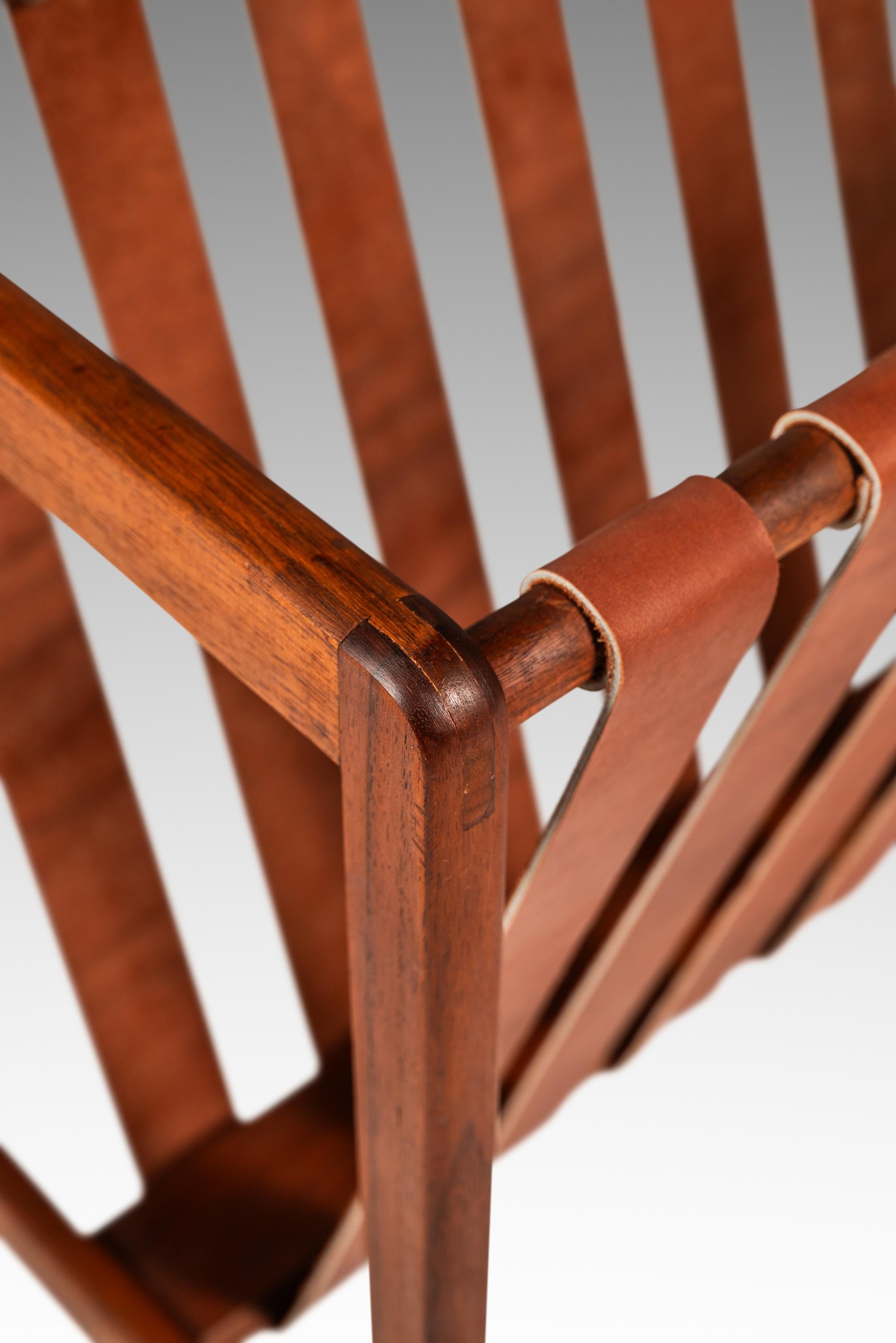 Brutalist Magazine Rack in Solid Teak with Leather Straps, Denmark, c. 1960s For Sale 5