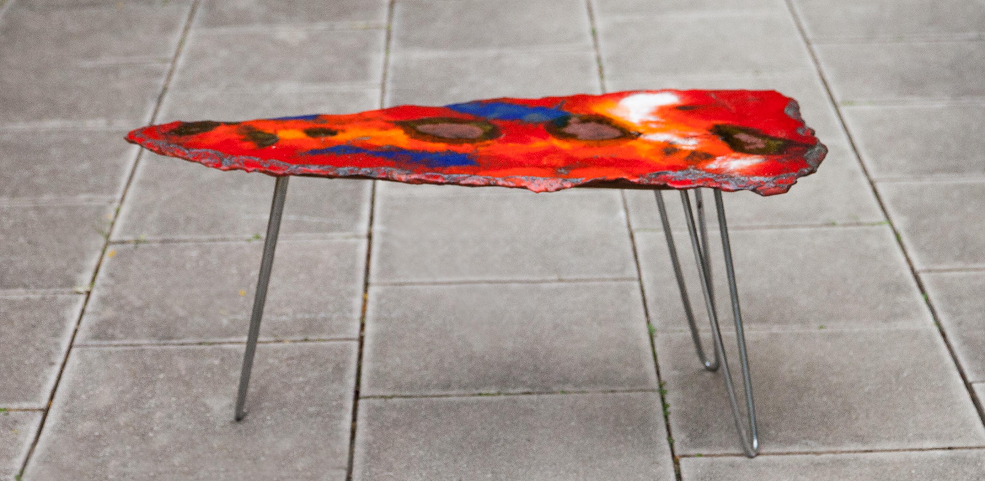 Wonderful tripod side table with steel hairpin bases and a colourful ceramic top.