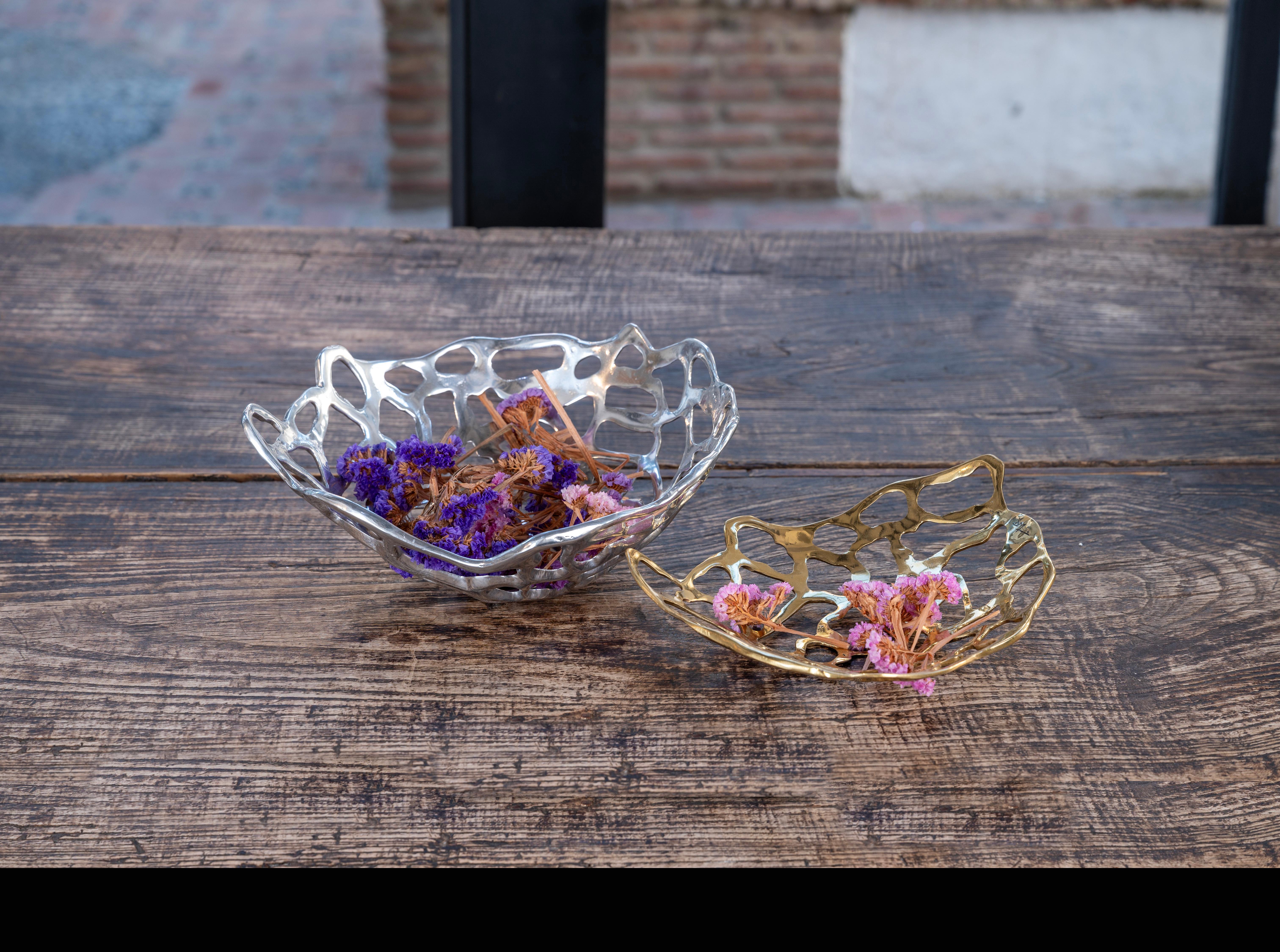 The decorative Medium Mesh Fruit  Bowl was created by David Marshall, it is made of sand cast aluminum .
Handmade, mounted and finished in our foundry and workshop in Spain from recycled materials.
Certified authentic by the Artist David Marshall