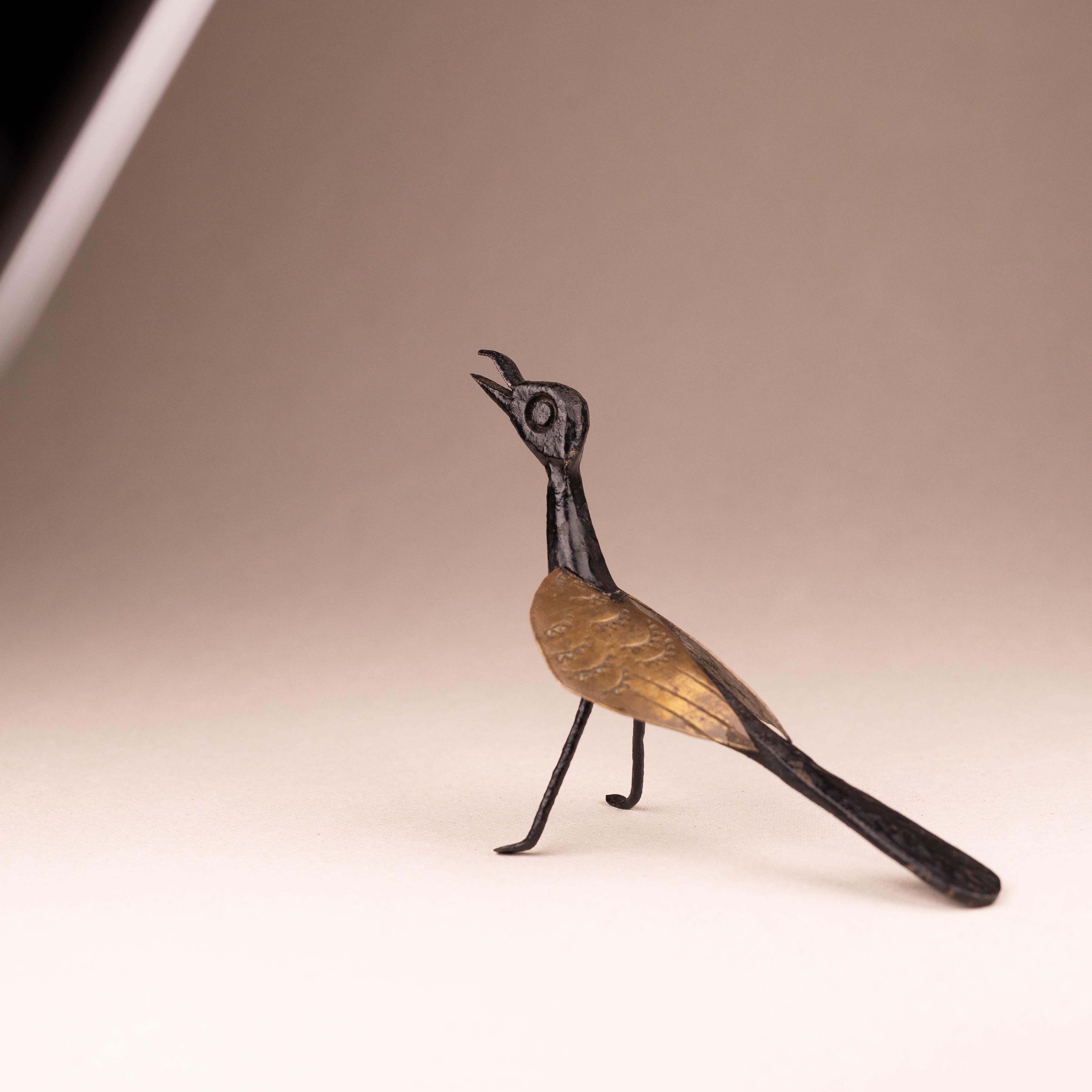 Brutalist Metal Bird Sculpture in Iron and Brass, Mid Century Modern, France.

A rare and expressive design, finely crafted in wrought iron and brass.

The metalwork is particularly interesting in this piece. 

A mix of rough texture for the body