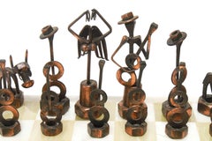 Brutalist Metal Chess Pieces with Onyx Chess Board