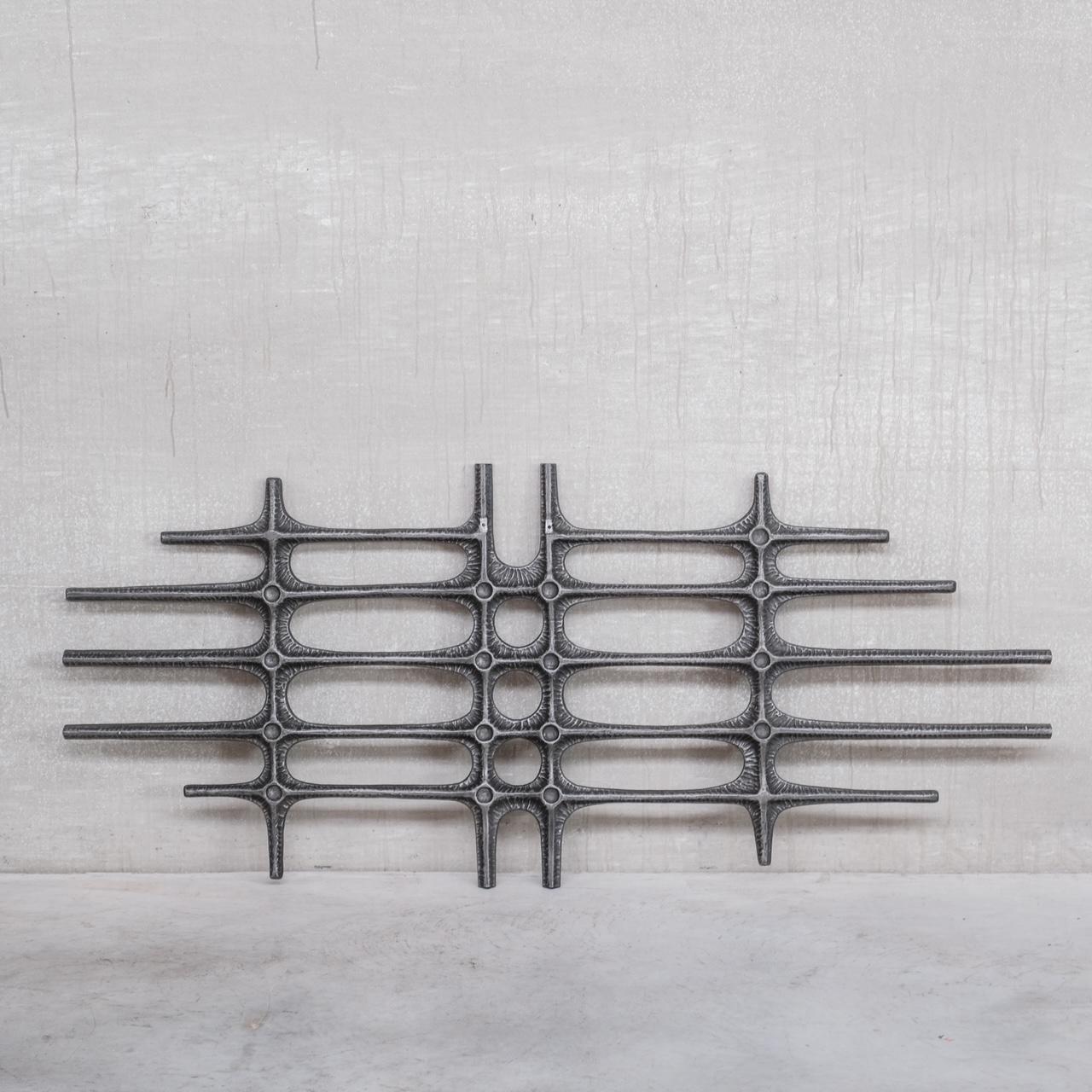 A large brutalist wall hanging or wall art. 

Belgium, c1960-70s. 

Good quality, this wall hanging remains remarkable contemporary in today's environment. 

Location: Belgium Gallery. 

Dimensions: 184 W x 80 H x 3 D in cm. 

Delivery: