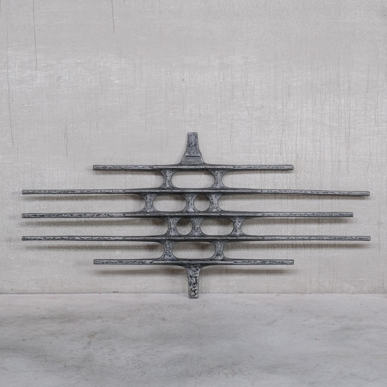 A large brutalist wall hanging or wall art. 

Belgium, c1960-70s. 

Good quality, this wall hanging remains remarkable contemporary in today's environment. 

Location: Belgium Gallery. 

Dimensions:96 H x 200 W x 5 D in cm. 

Delivery: