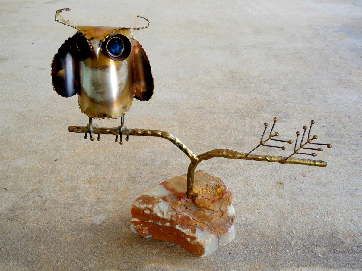 Curtis Freiler and Jerry Els, collectively known as Curtis Jeré, produced marvellous metal sculptures in the early seventies. These adorable owls in brass and enamel sit on branches planted in quartz. Signed and dated 1968 and 1969.

Unlike