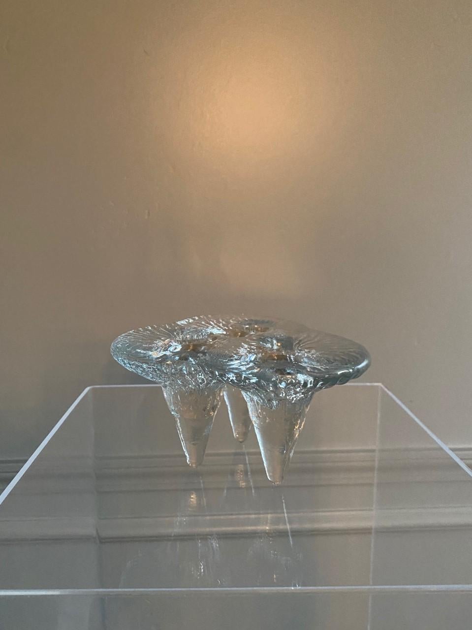 Beautiful vintage Blenko candleholder. Shaped in an artistic organic amoeba form, this glass sculpture is beautiful, artful and sculptural all at the same time. An amoeba like form encompasses the top while a tripod form adds a sculptural profile.