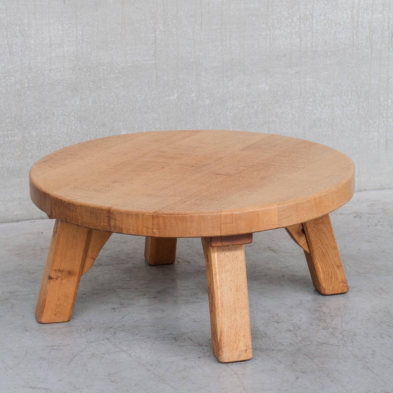 A large brutalist coffee table. 

Blonde oak. 

Holland, c1970s. 

Good condition, some scuffs and wear commensurate with age. 

Thick chunky surface and legs. 

Location: Belgium Gallery. 

Dimensions: 30 H x 13 D x 21 W in cm.