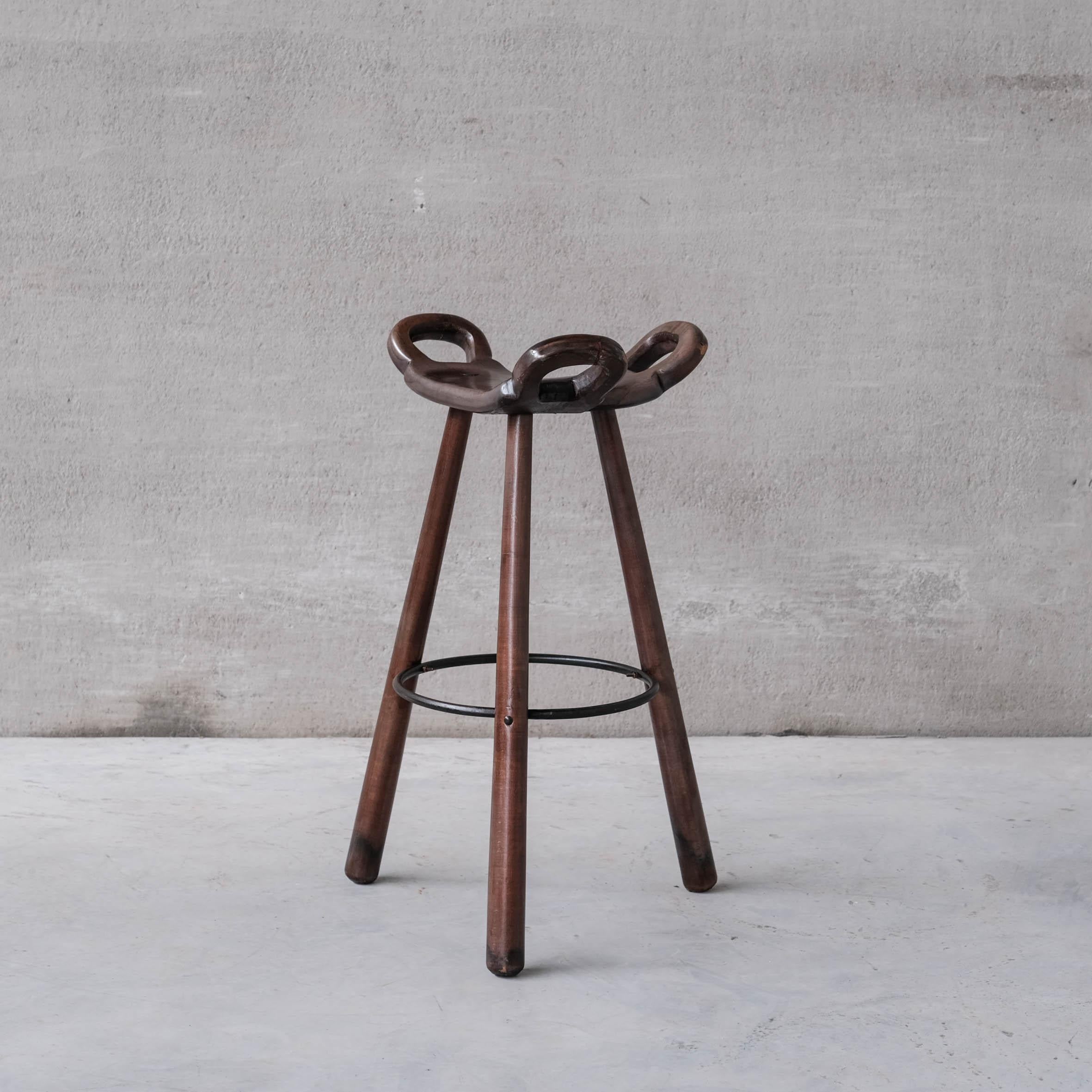 Well crafted wooden and iron bar stools.

Slightly thicker legs to others we have available, we have at least two available in this style, possibly a third so best to enquire as to availability.

Spain, c1970s.

Likely by Confonorm, Spain. Often