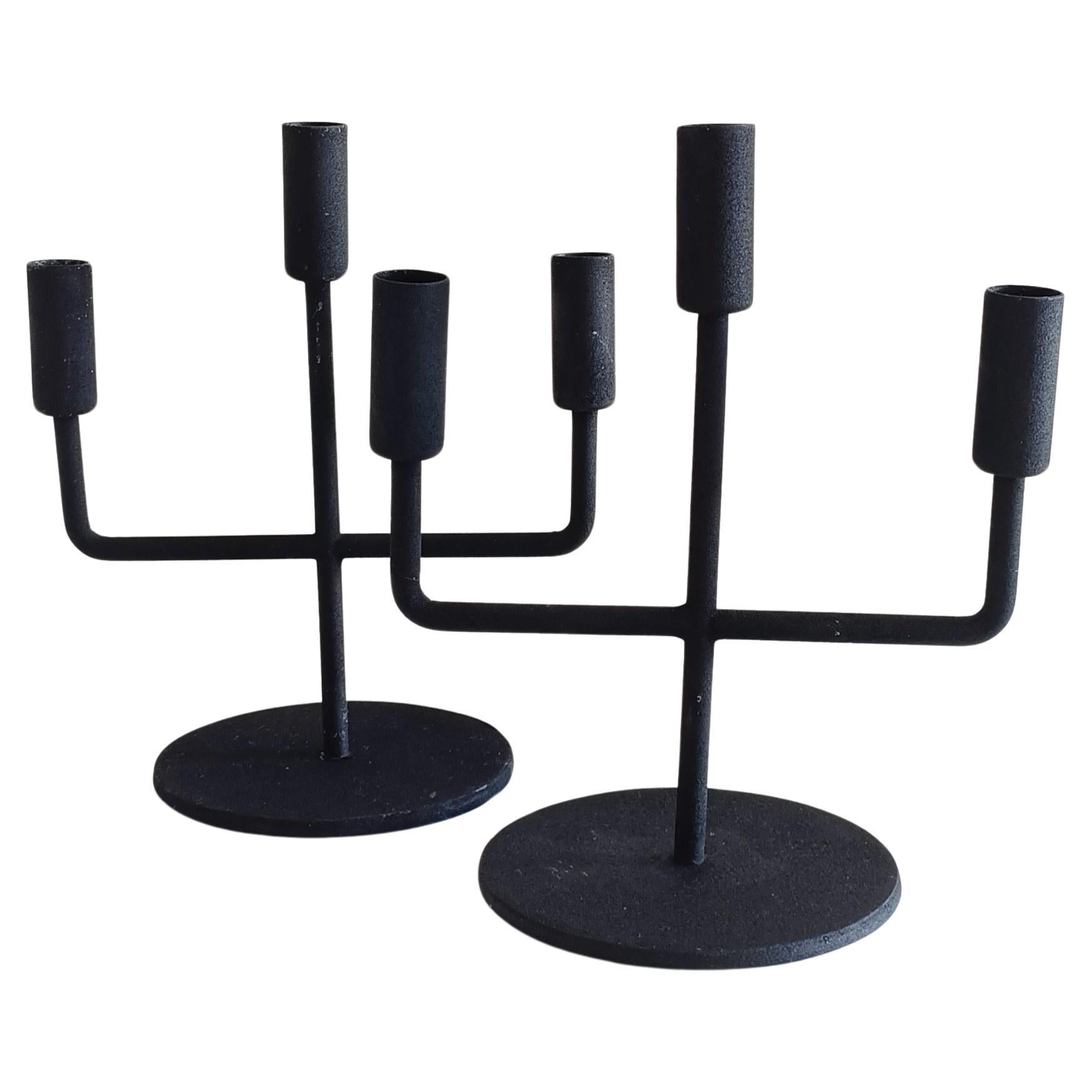 Midcentury Brutalist Minimalist Forged Iron Candelabra – Pair, Germany

A striking pair of forged iron candelabra, handmade in Germany during the mid-20th century. With a Brutalist yet minimalist design, they balance raw materiality with clean,
