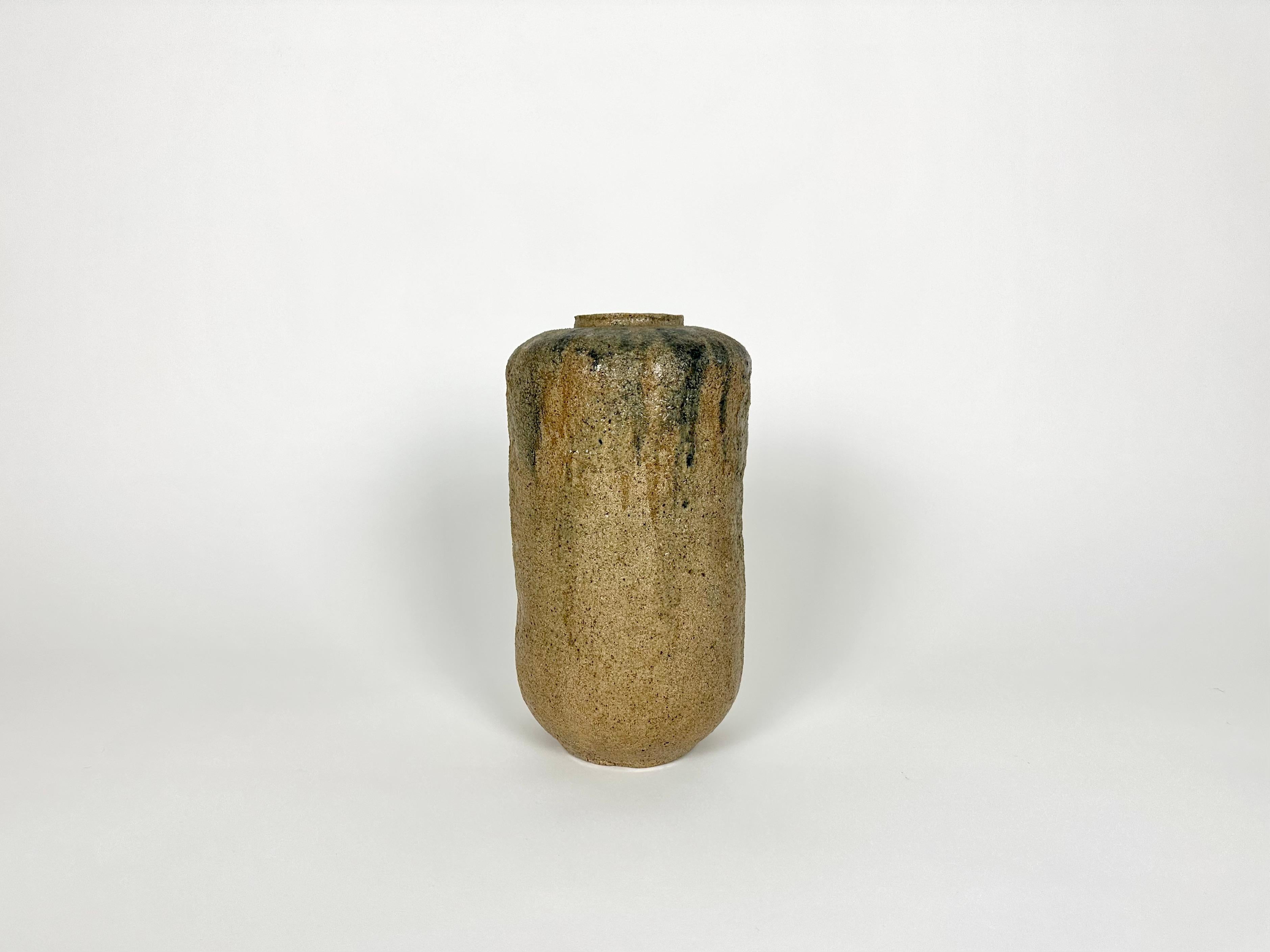 Brutalist Mid century modern stoneware vase. England, mid 20th century.

A sculptural, hand thrown studio pottery vase with a wonderful natural textured glazed finish,

Good size, excellent condition with no damage.

Dimensions (cm): 28h. 14 dia.