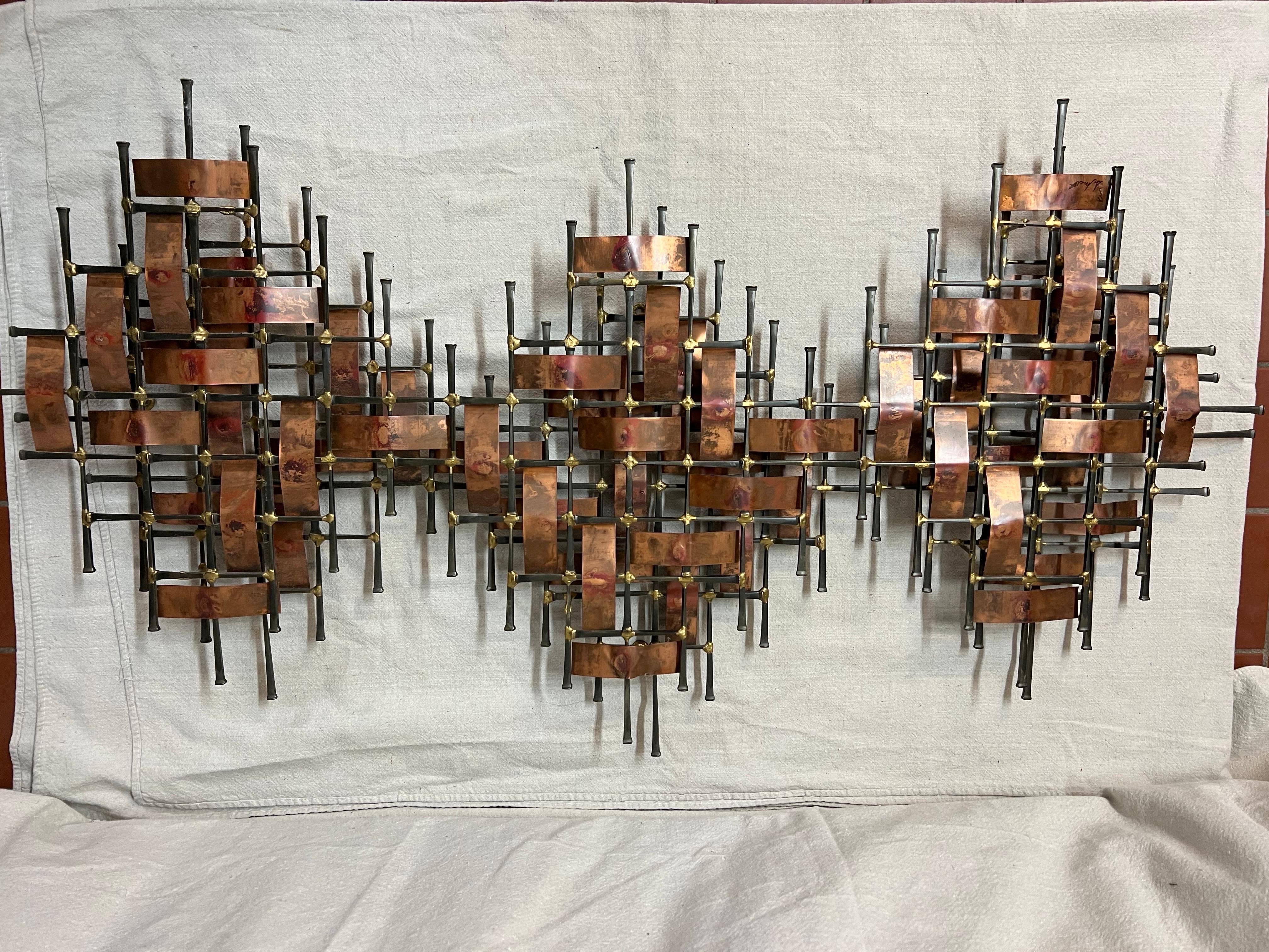 Brutalist Mid-Century Modern Nail Art sculpture signed Schwartz. Brutalist style copper and steel wall sculpture handmade and signed by Ron Schmidt. Highly textural woven metal design with mixed metal tones. Hang vertically or horizontally.