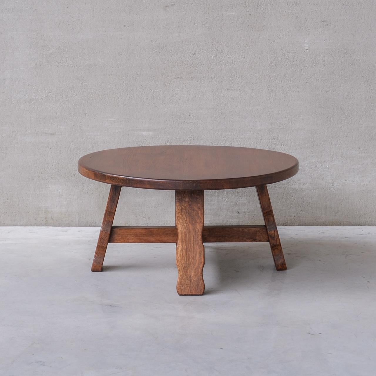 A circular brutalist coffee table. 

Belgium, c1970s. 

Simple clean lines, circular top over four legs. 

Good condition, some scuffs and wear commensurate with age.

INTERNAL REFERENCE: 284/CT004. 

Location: Belgium