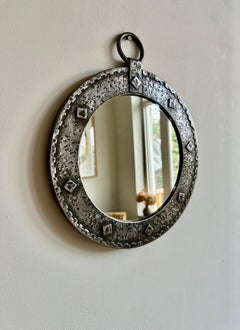 Brutalist mid-century round wall mirror. France c.1950