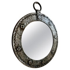 Brutalist mid-century round wall mirror. France c.1950
