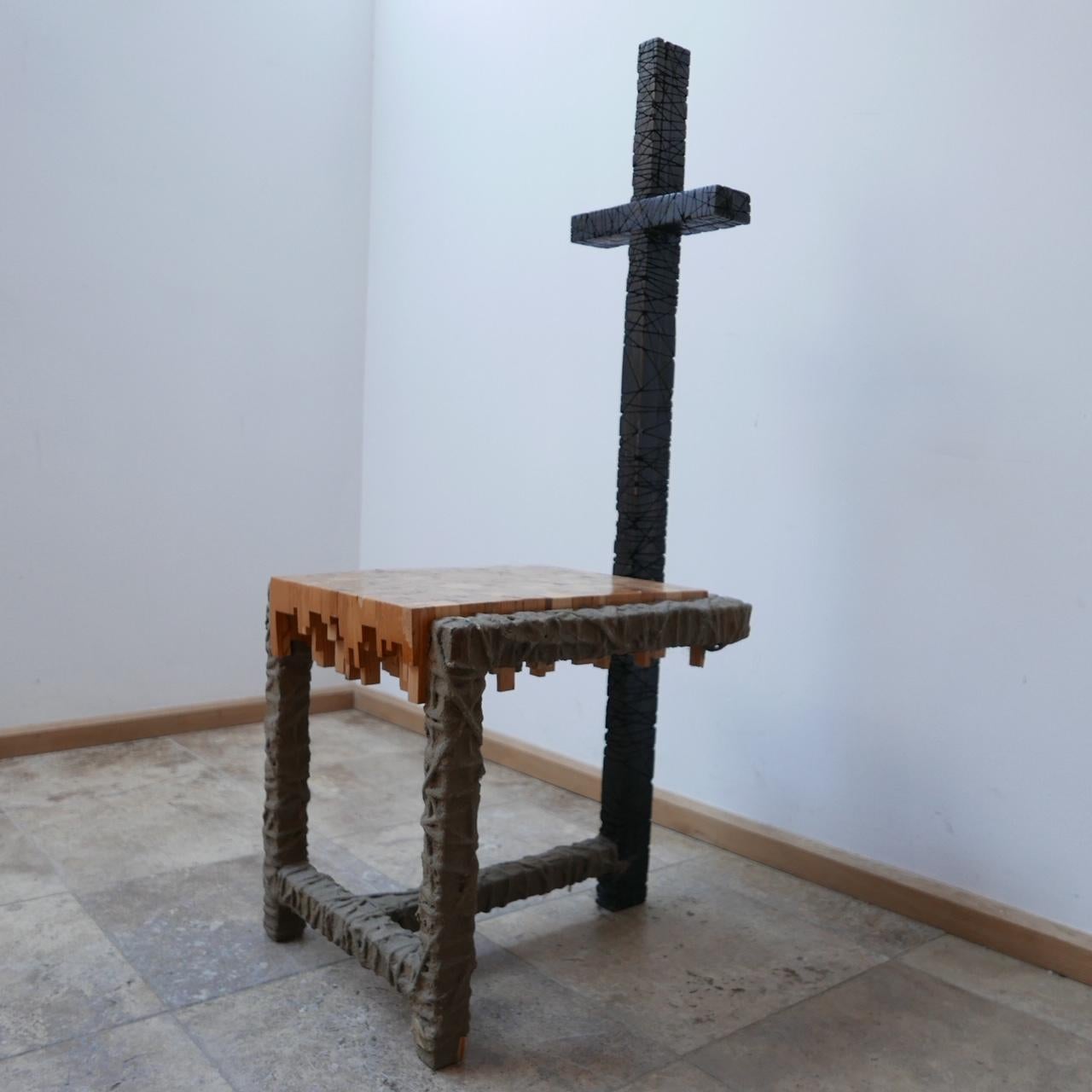 An unusual occasional sculptural chair, likely artist made as a unique piece. 

Sweden, c1980s. 

Mixed media. 

Hand crafted construction, pinewood segmented seats, cross shaped back, the sides are wrapped with rope and coated with a rope,