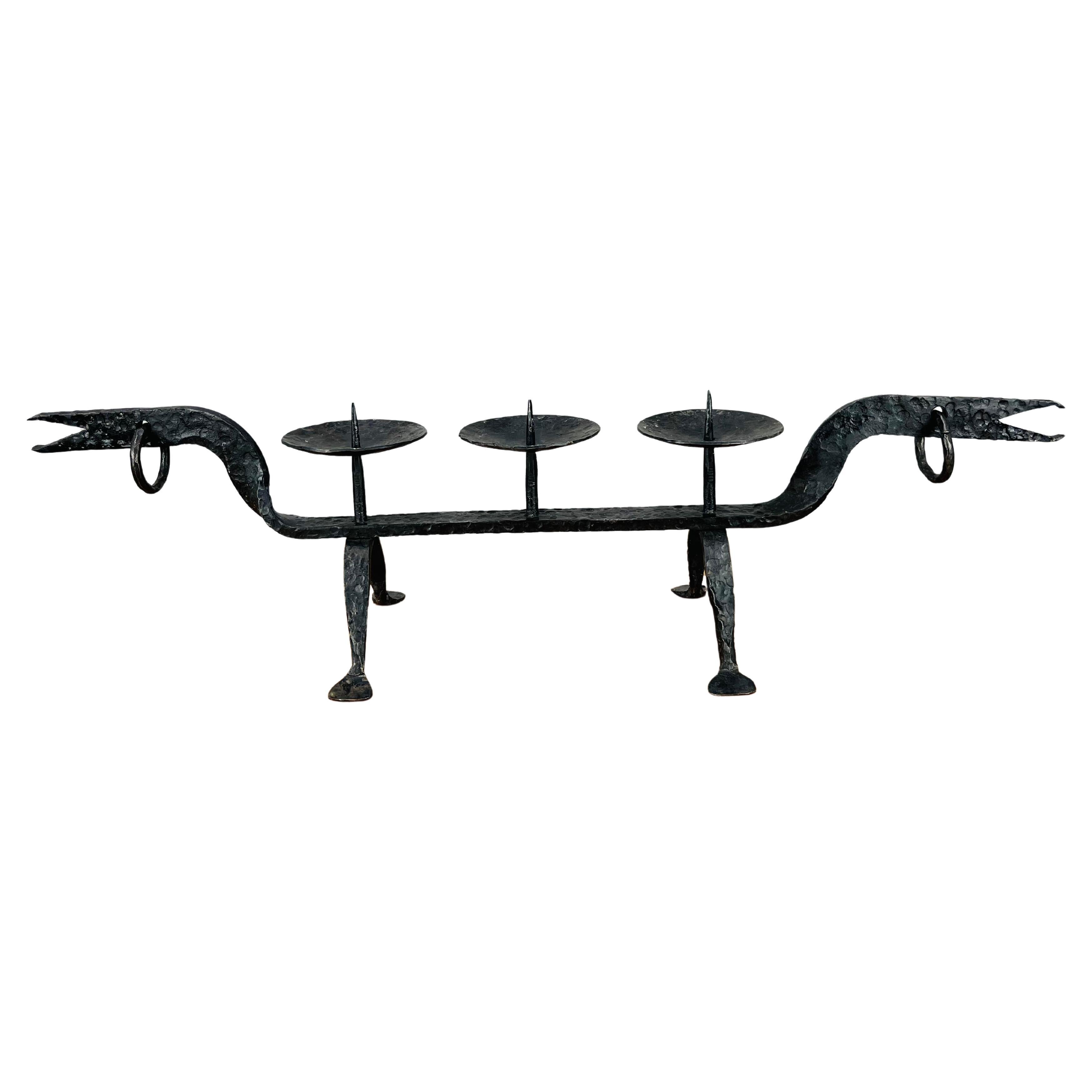 Brutalist Mid Century zoomorphic wrought iron candelabra candle holder