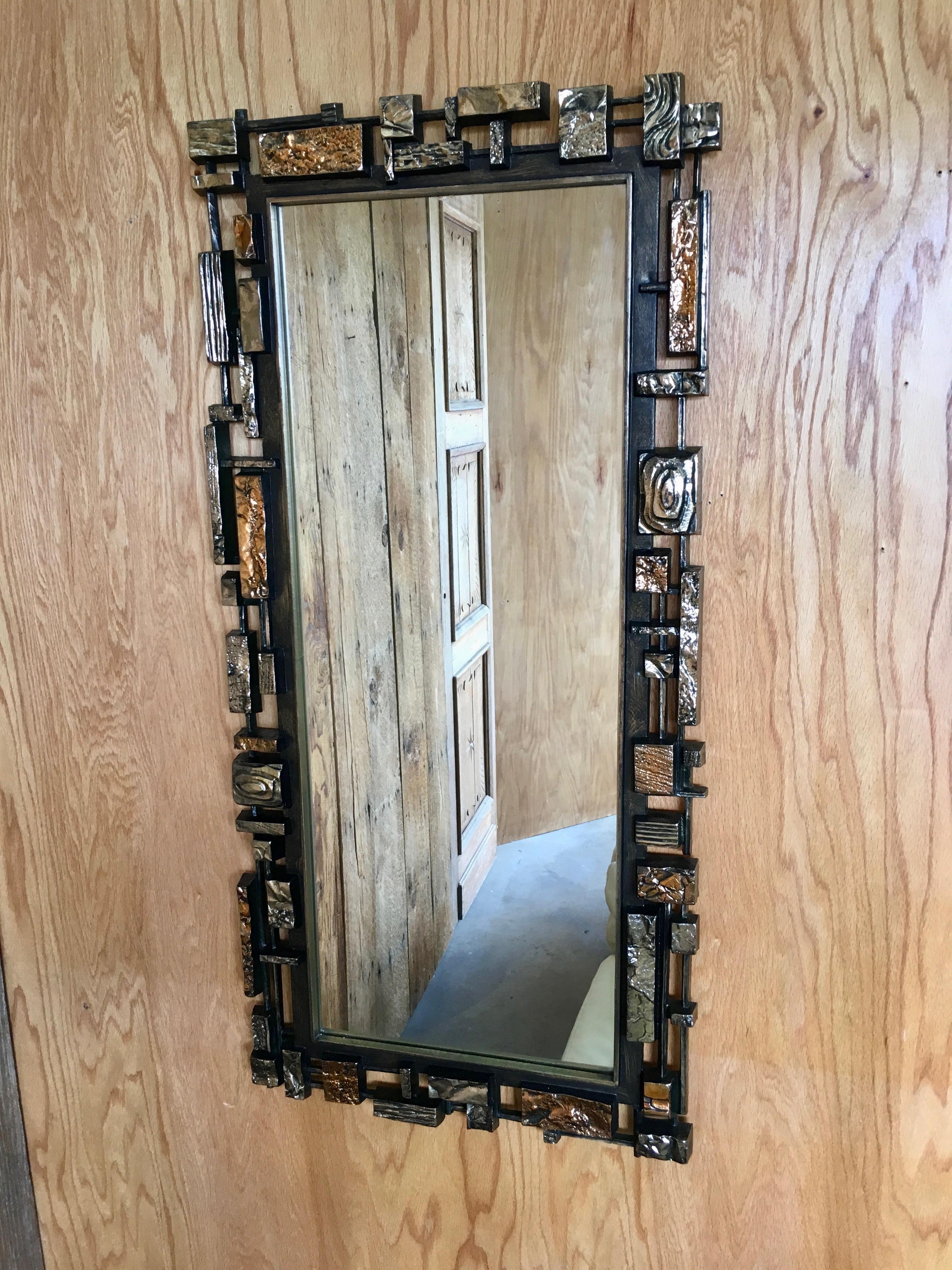 Brutalist entry mirror by Syroco Gilt resin construction, signed 