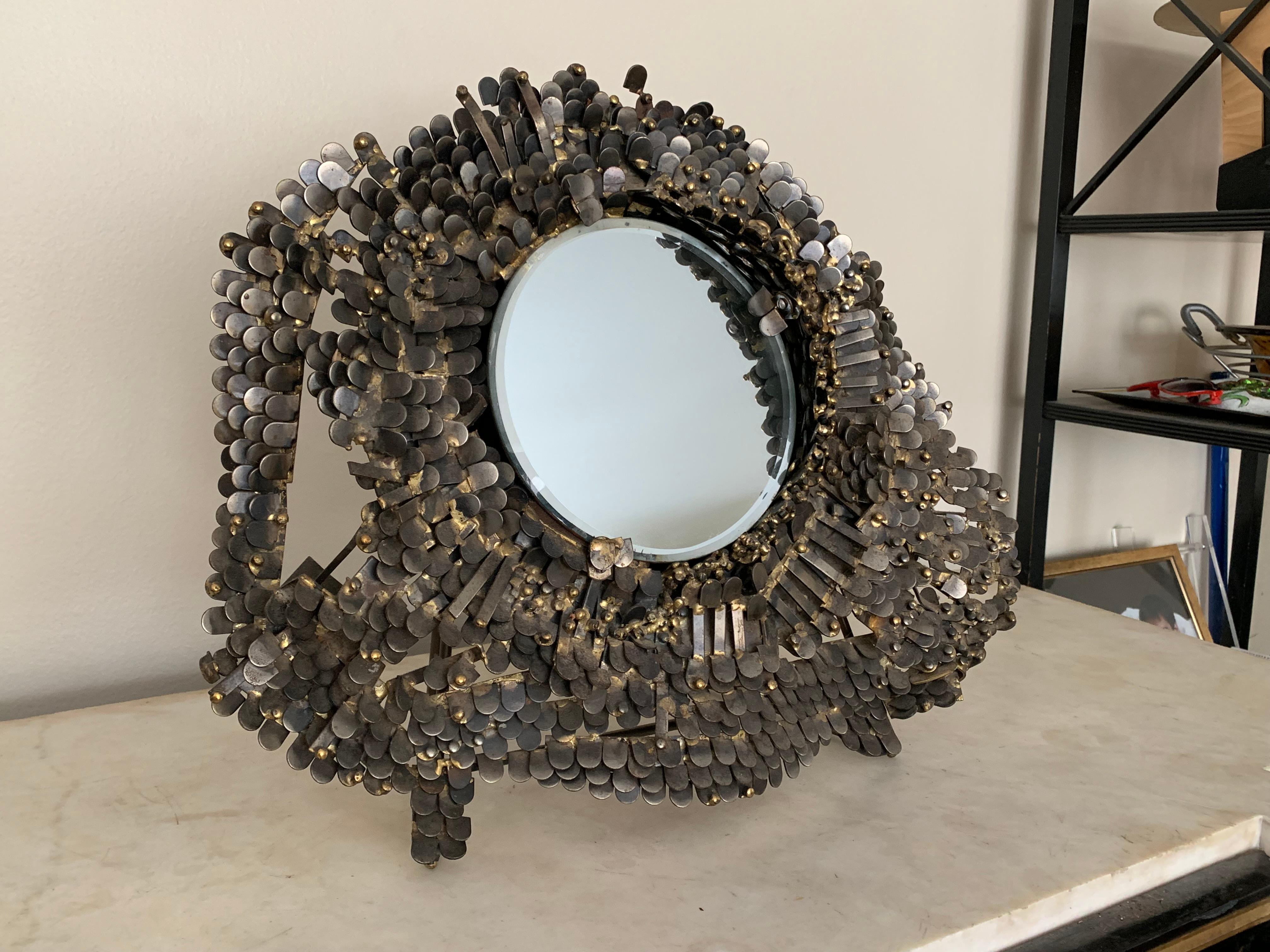 Vintage Brutalist mirror Richard Bitterman, tabletop or wall hung
incredible detail
elegant piece that will stop you in your tracks.
Piece has hardware to hang and also a metal stand to place on tabletop, mantel (fireplace), cabinet.
