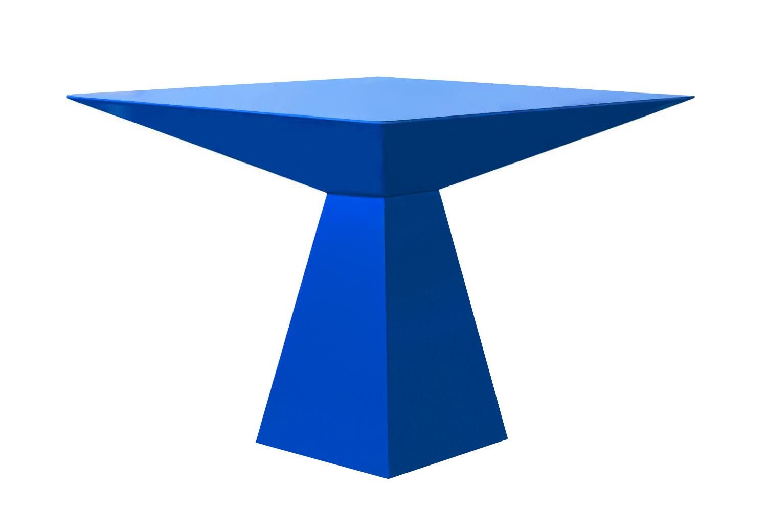 The Desfase Dining Table is a bold exploration of form and rhythm, a true celebration of disruption and individuality. Its striking black lacquered surface exudes sophistication, reflecting light in a way that enhances its sculptural presence.