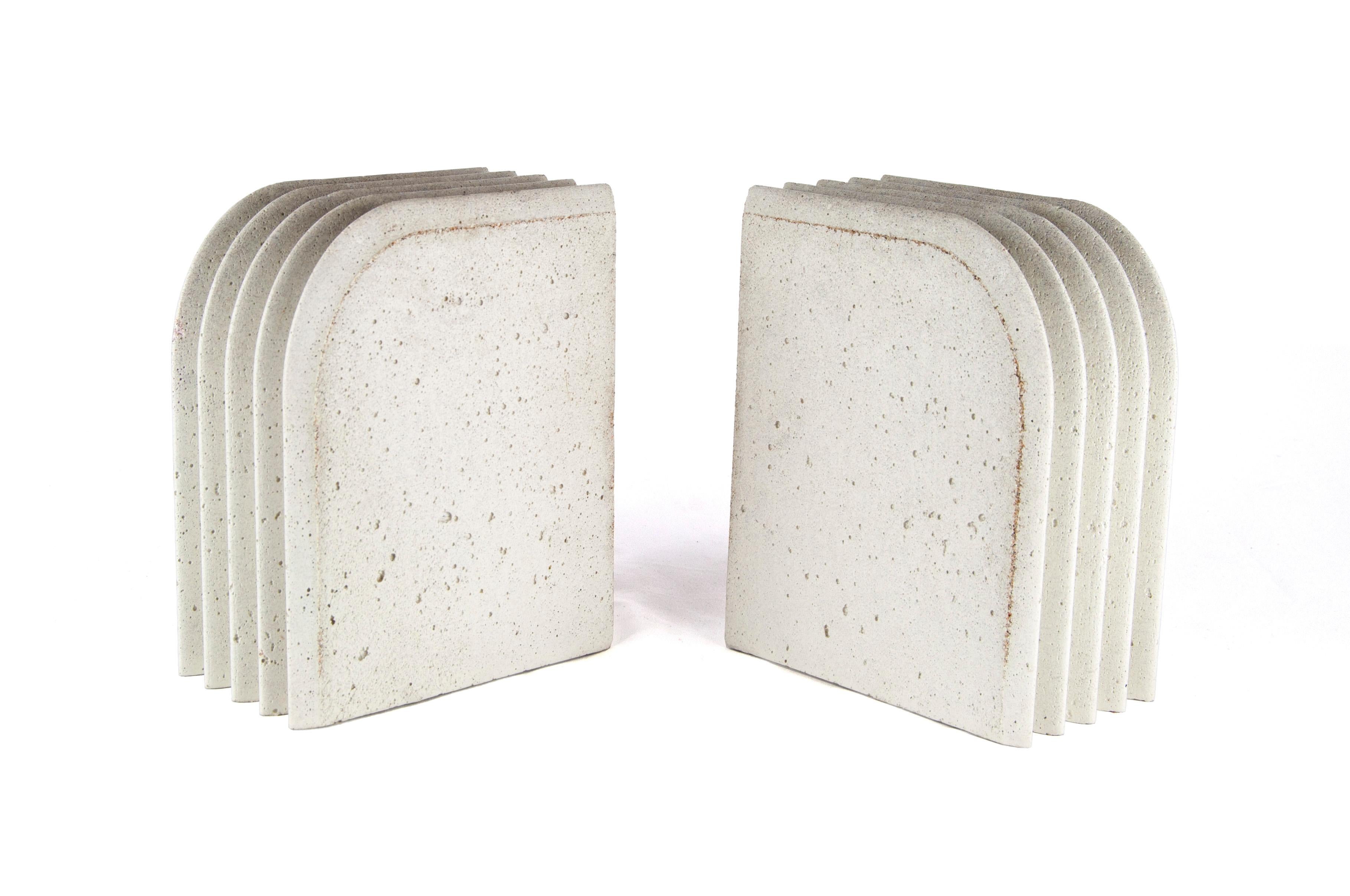 These geometric concrete bookends will keep your literature in place with their timeless, sculptural beauty, as well as with their substantial weight. 

Small batches, with limited quantities available. 

Chris has recently shifted from making