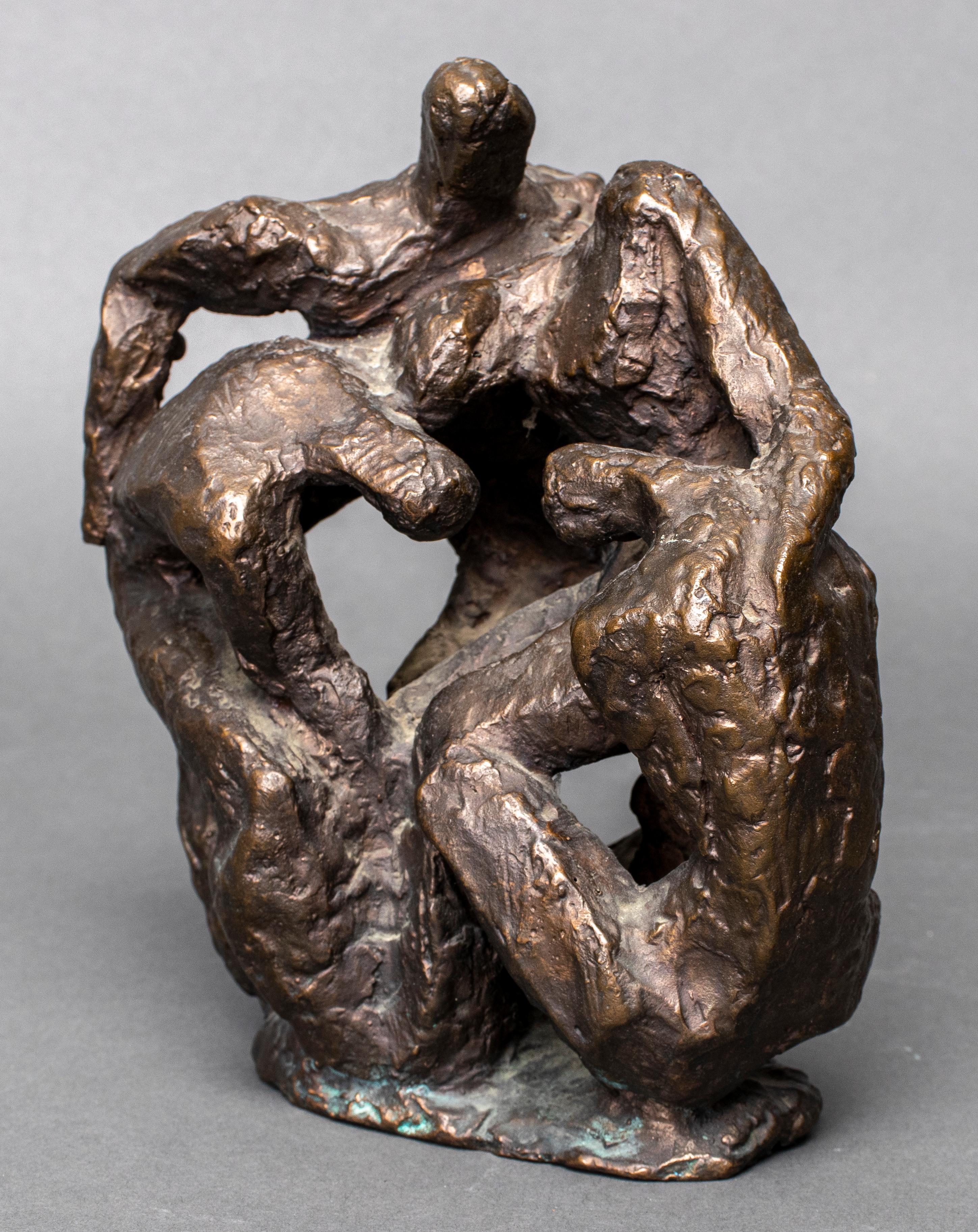 Brutalist modern bronze sculpture, depicting four interconnected figures huddled together. 7.75