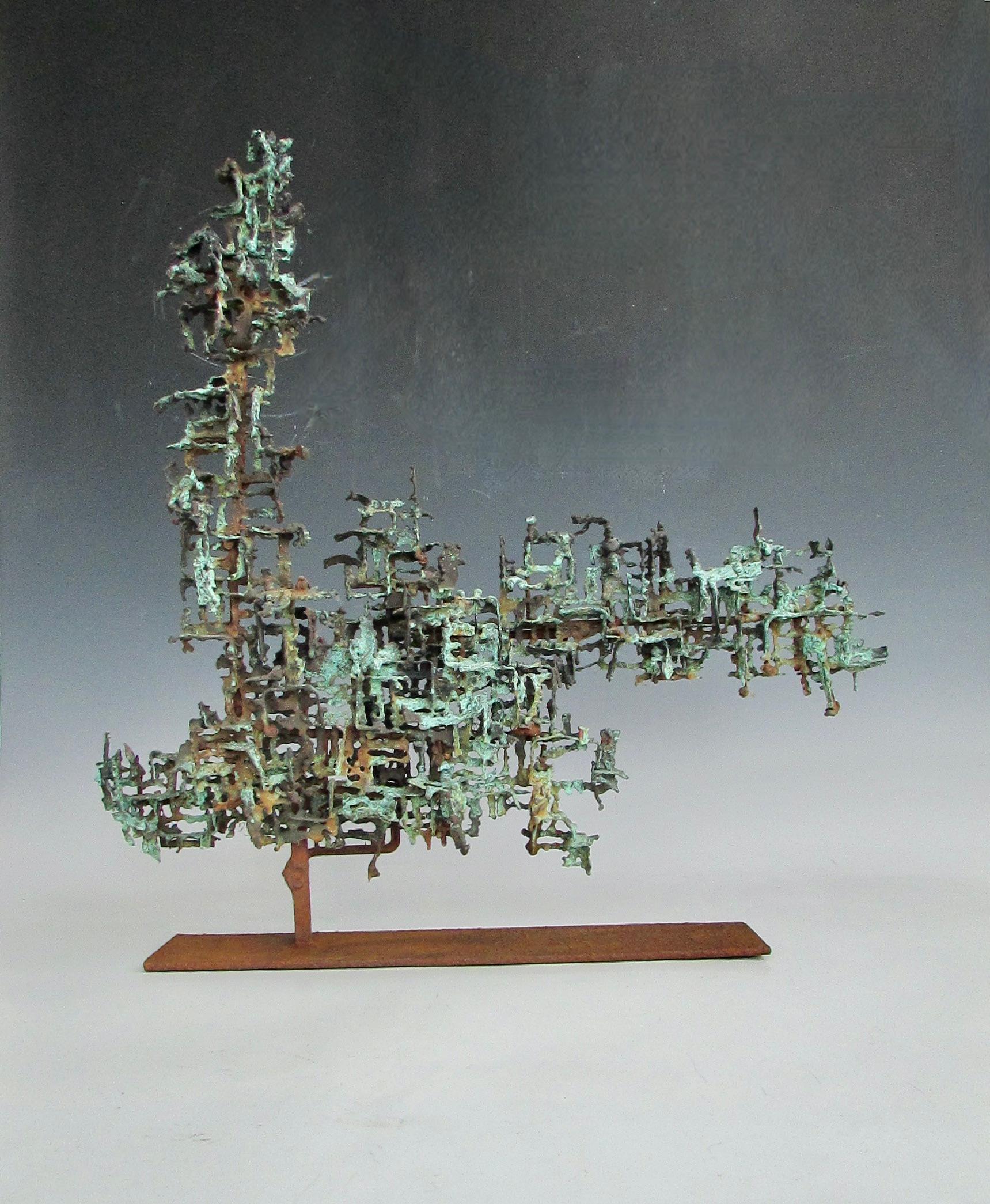 Believed to be an earlier work by Marcello Fantoni (1915-2011) sculptor, ceramicist, metalworker, multi-media artist and designer . A study in patina and corrosion in brutalist  yet modernist style . Patinated copper over welded steel skeleton .